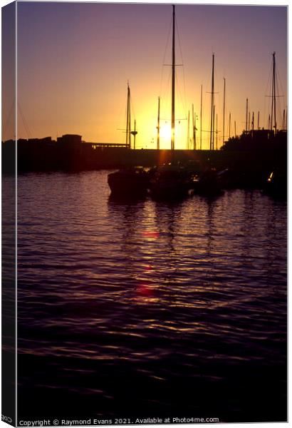 Sunset sailing boats  Canvas Print by Raymond Evans