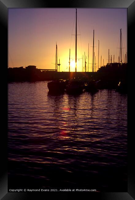 Sunset sailing boats  Framed Print by Raymond Evans