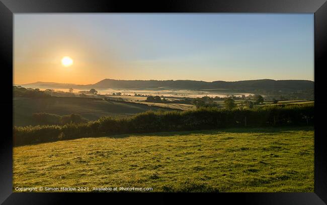 South Shropshire Autumn Sunrise with valley mist Framed Print by Simon Marlow