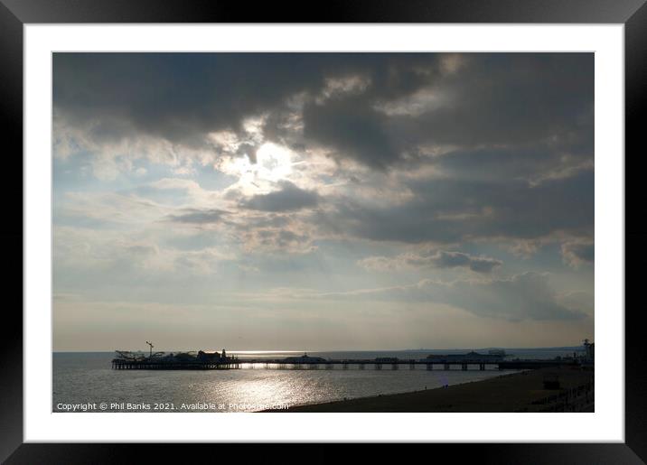 Evening sun and clouds at Brighton Pier, West Sussex, England Framed Mounted Print by Phil Banks