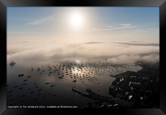 Falmouth Harbour in the mist Framed Print by Tim Woolcock