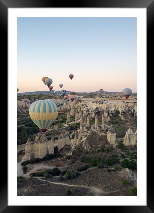 Colorful hot air balloons in the sunrise autumn morning. Goreme National Park, Cappadocia, Turkey. Aerial view Framed Mounted Print by Arpan Bhatia