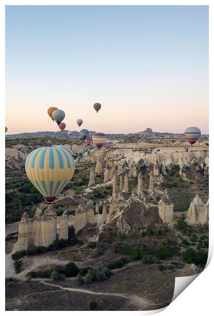 Colorful hot air balloons in the sunrise autumn morning. Goreme National Park, Cappadocia, Turkey. Aerial view Print by Arpan Bhatia