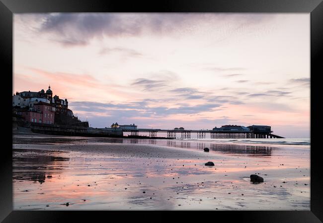 Reflections of Cromer pier Framed Print by Jason Wells