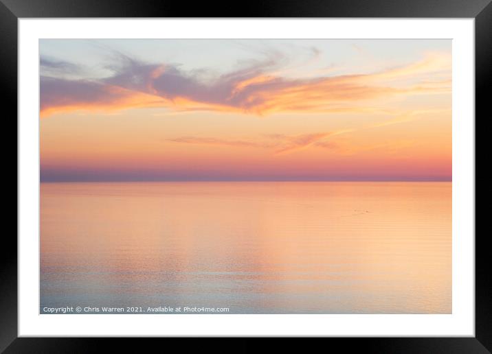 Sunset clouds over a calm sea Framed Mounted Print by Chris Warren