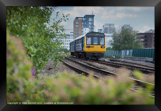 Modern train Manchester Framed Print by Giles Rocholl