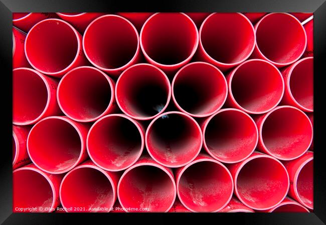 Abstract red plastic tubes Framed Print by Giles Rocholl