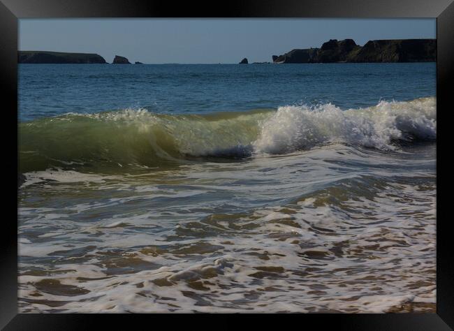 Breaking Wave on a Tenby Beach Framed Print by Jeremy Hayden