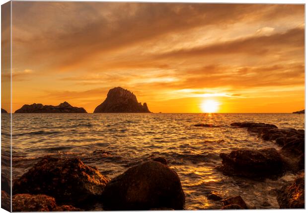 A sunset with the golden sky in Es Vedra, Ibiza Canvas Print by Vicen Photo