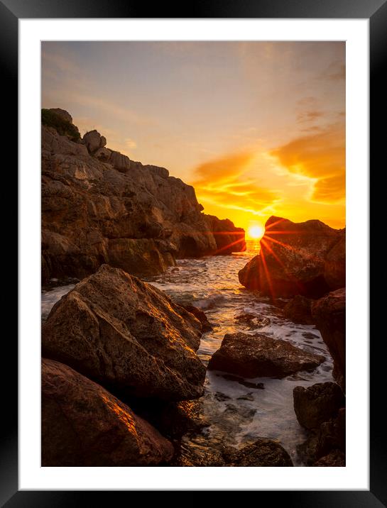 Sunrise between the rocks in a cove of La Renega, Oropesa Framed Mounted Print by Vicen Photo