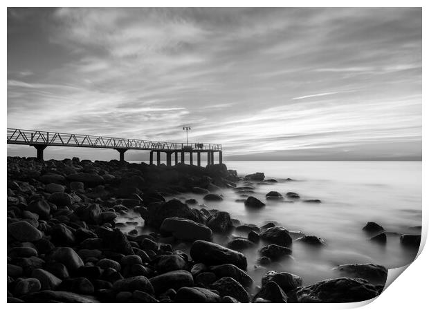 Sunrise next to a rocky beach in black and white Print by Vicen Photo