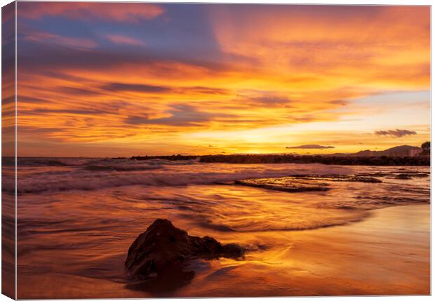 A reddish and cloudy sunset on the beach Canvas Print by Vicen Photo