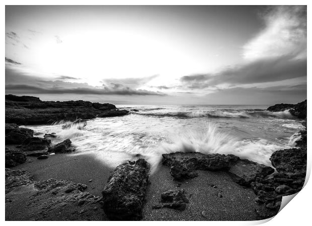 A wave crashing against the rock on a beach in black and white Print by Vicen Photo