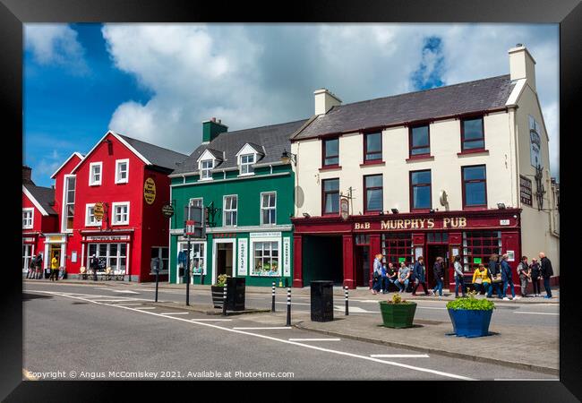Colourful buildings in Dingle Town, County Kerry Framed Print by Angus McComiskey