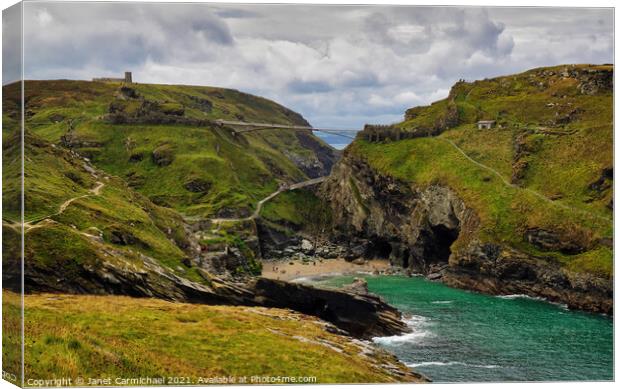 Merlin's Cave and Tintagel Cove Canvas Print by Janet Carmichael