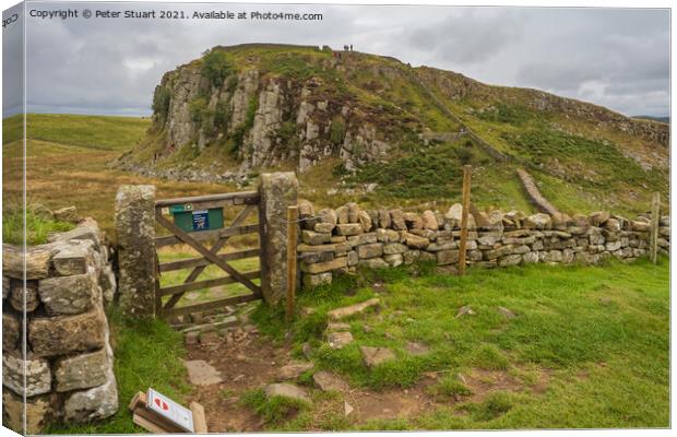 Peel Crags above Once Brewed on Hadrian's Wall Walk Canvas Print by Peter Stuart