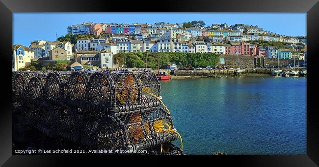 Brixham Harbour and crab pots Framed Print by Les Schofield