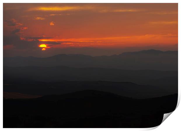 Silhouettes of the mountains under a sunset with the reddish sky Print by Vicen Photo
