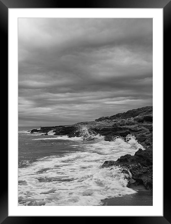 Waves crashing against rocks on a cloudy day Framed Mounted Print by Vicen Photo