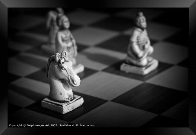 Chess. White knight on a chinese chess game  Framed Print by Delphimages Art