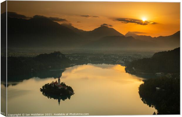 Sunrise over Lake Bled from Mala Osojnica Canvas Print by Ian Middleton