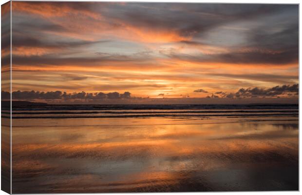 Westward Ho! Reflective beach sunset Canvas Print by Tony Twyman