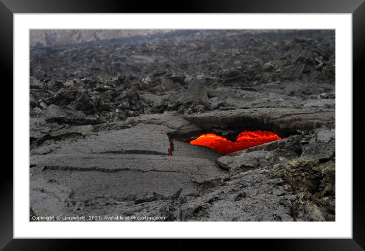 Heart-shaped opening revealing lava in Iceland Framed Mounted Print by Lensw0rld 