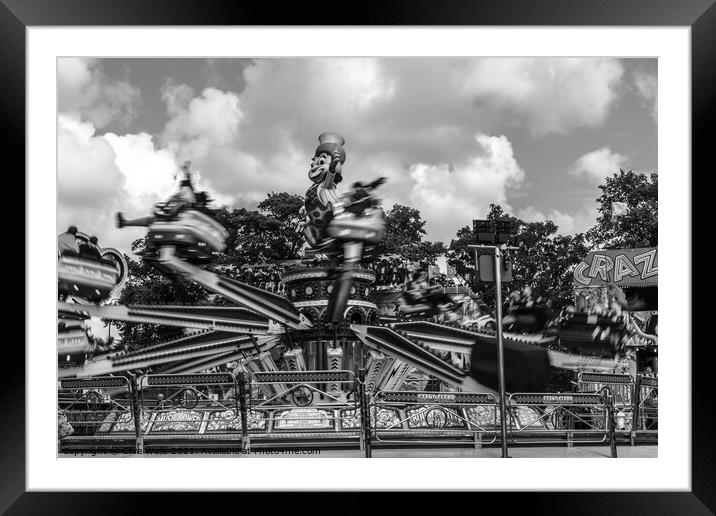 Monochrome fairground ride Framed Mounted Print by Clive Wells