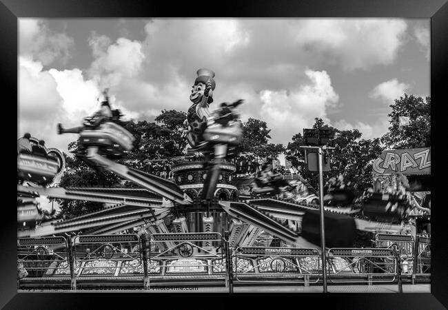 Monochrome fairground ride Framed Print by Clive Wells