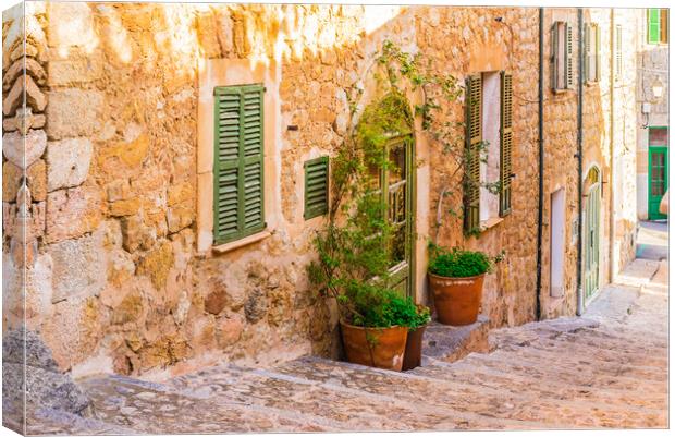 Idyllic view of an street in the old village Deia on Mallorca Canvas Print by Alex Winter