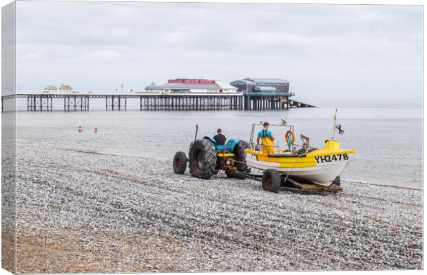 Fishing boat being recovered at Cromer Canvas Print by Jason Wells