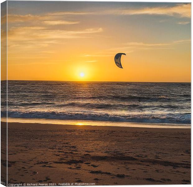 Kitesurfer at Sunset on the beach at South Milton  Canvas Print by Richard Fearon
