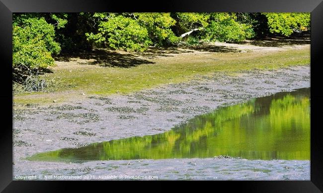 Incoming Tide Reflections Framed Print by Neil Mottershead