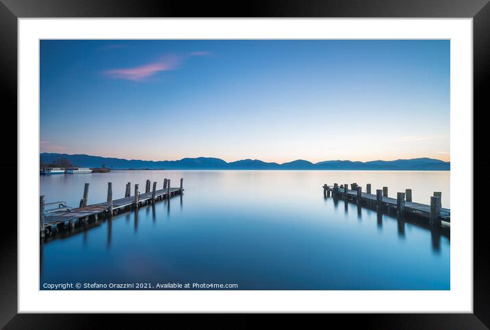 Two Wooden piers on a lake Framed Mounted Print by Stefano Orazzini