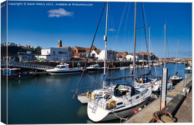 Sailing Boats in Eyemouth Harbour Canvas Print by Navin Mistry