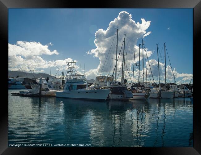 Picturesque nautical scene with huge white cumulonimbus clouds i Framed Print by Geoff Childs