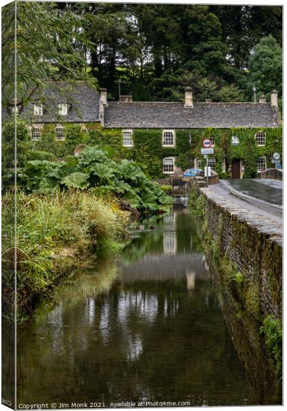 The Swan Hotel in Bibury Canvas Print by Jim Monk