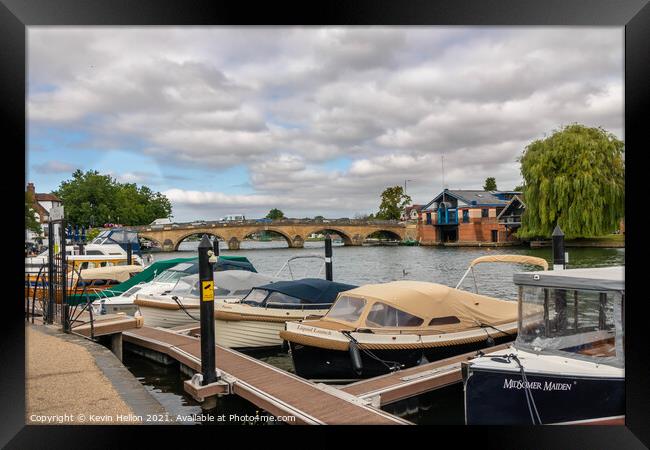 Boats moored on the River Thames Framed Print by Kevin Hellon