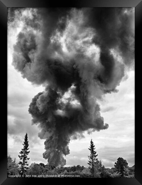 Oily smoke plume Framed Print by John Rae