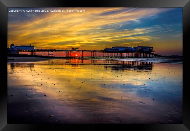 Mesmerising Cromer Beach Sunset Framed Print by Avril Harris