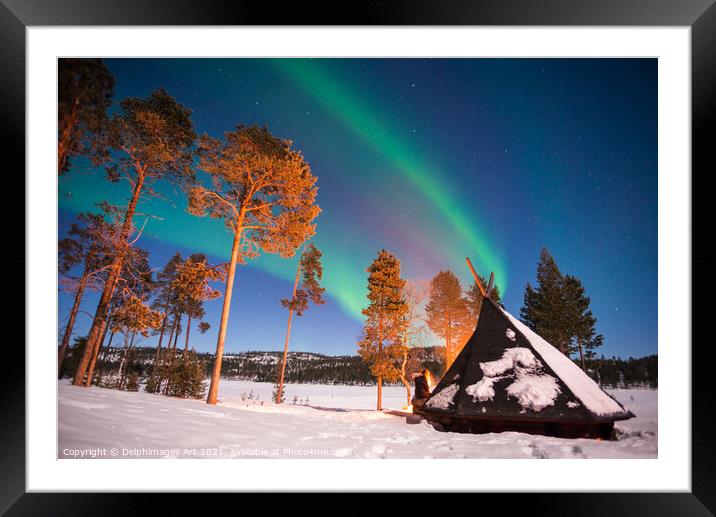Northern lights by the lake in Finland Framed Mounted Print by Delphimages Art