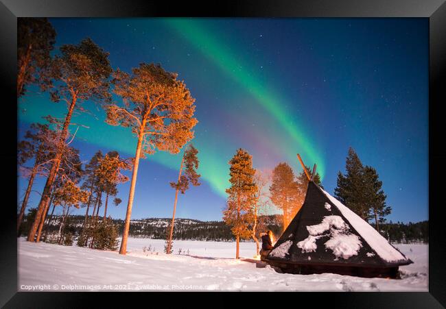 Northern lights by the lake in Finland Framed Print by Delphimages Art