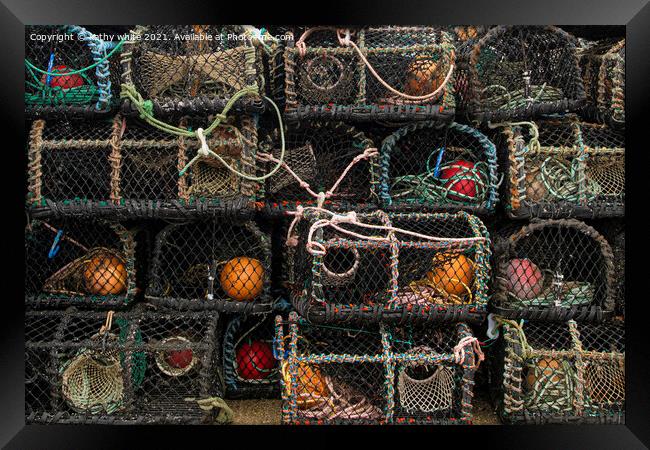 lobster pots Framed Print by kathy white