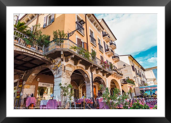 Desenzano del Garda, Italy - September 21, 2021: Terrace of a pi Framed Mounted Print by Joaquin Corbalan