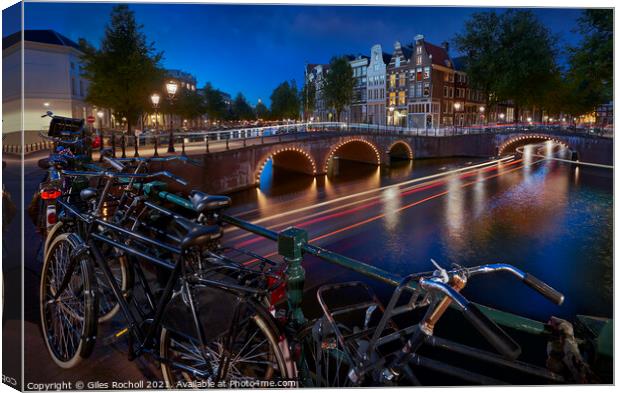 Amsterdam Bicycles and Canals dusk Canvas Print by Giles Rocholl