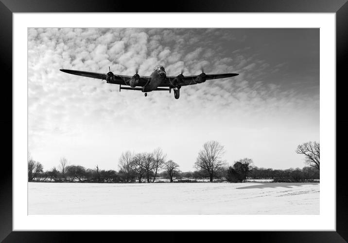 Nearly home - Lancaster limping back in winter B&W Framed Mounted Print by Gary Eason