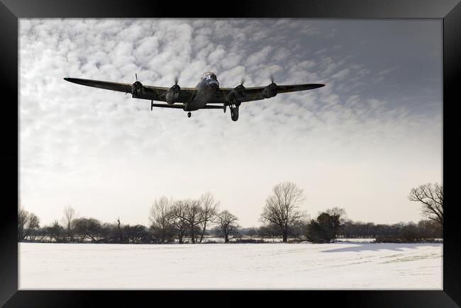 Nearly home - Lancaster limping back in winter Framed Print by Gary Eason