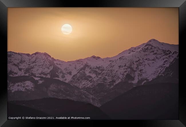 Alpi Apuane mountains orange sunset. Framed Print by Stefano Orazzini