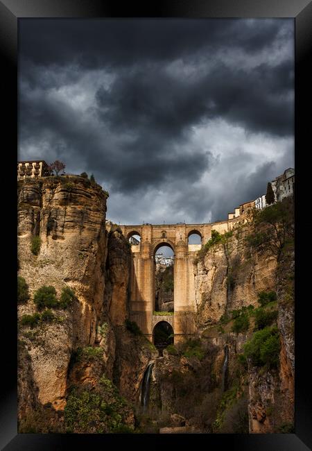 Stormy Sky Above Ronda Bridge In Spain Framed Print by Artur Bogacki