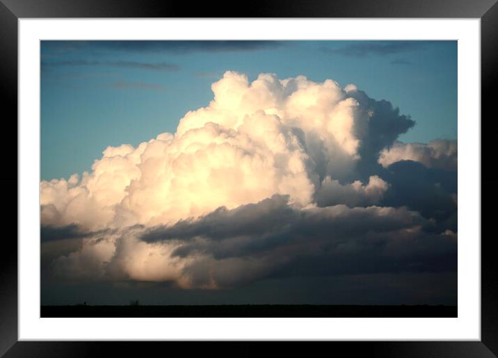 sunlit Thunder cloud Framed Mounted Print by Simon Johnson